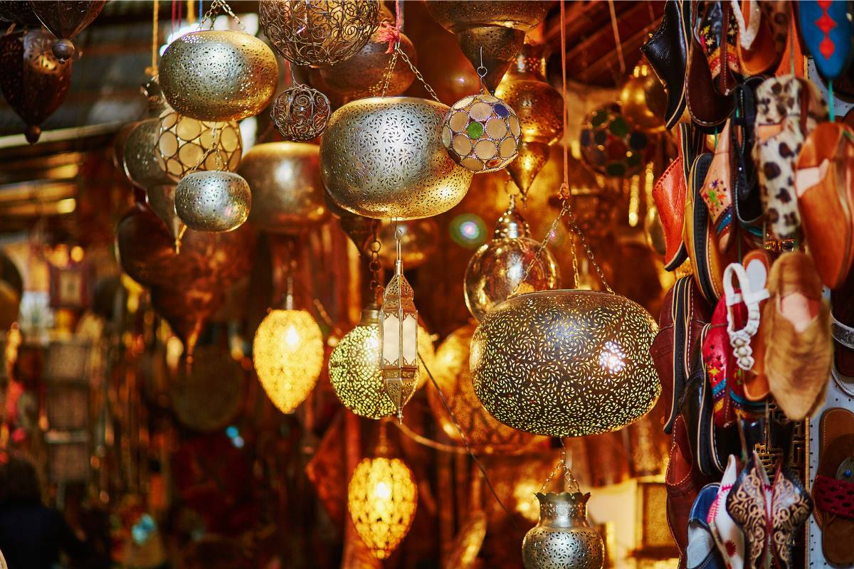 Traditional Moroccan golden ornamental lanterns and decorative spheres with warm lighting